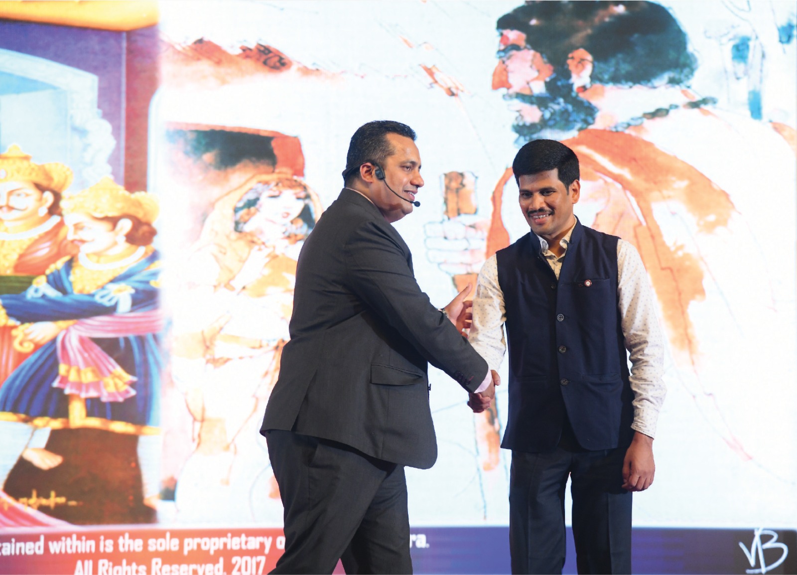 On-stage felicitation with the speaker