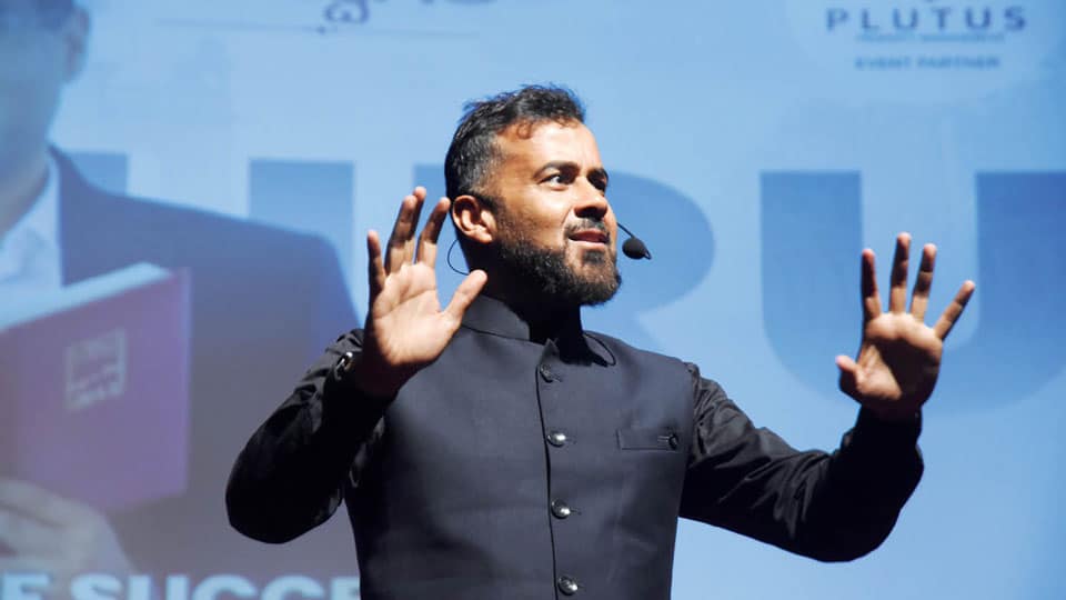 Speaker engaging the audience on stage